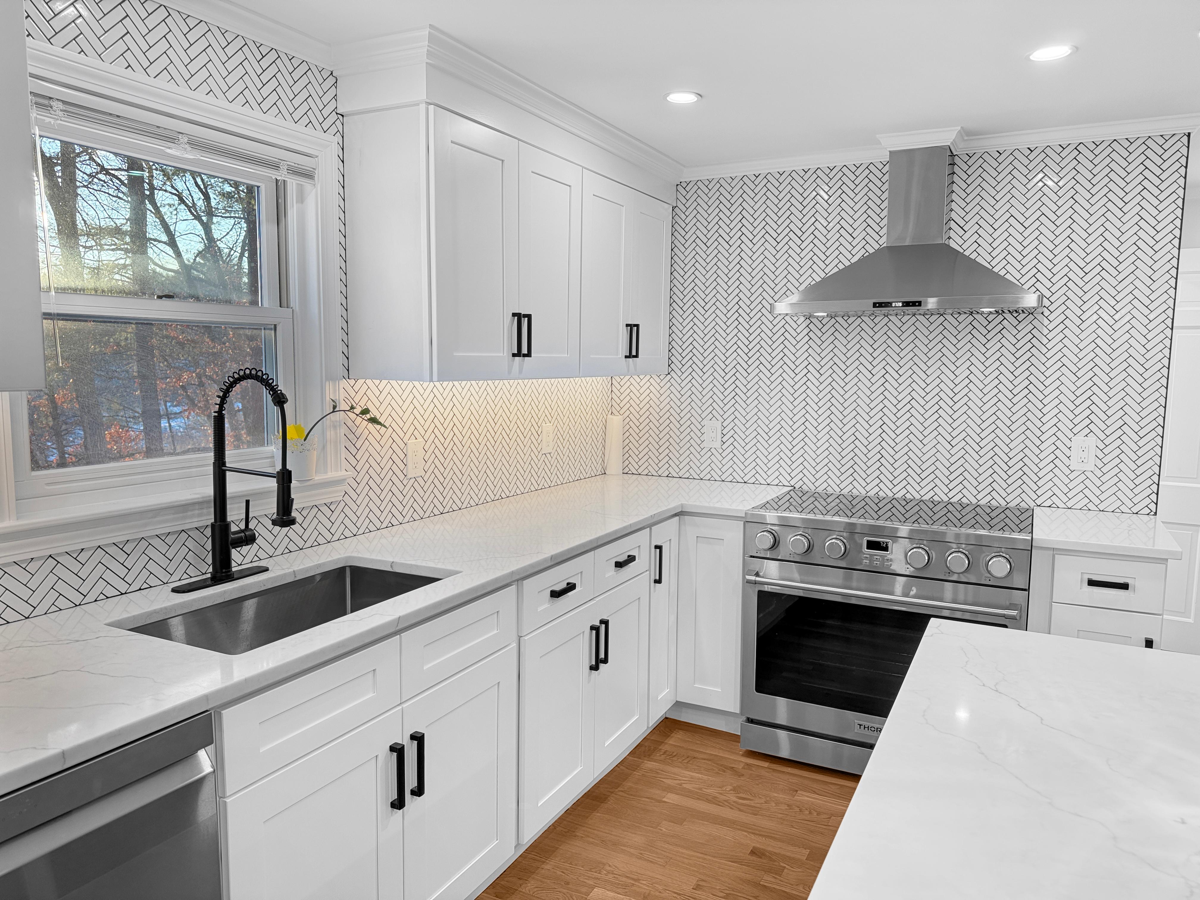 White Kitchen Herringbone Backsplash